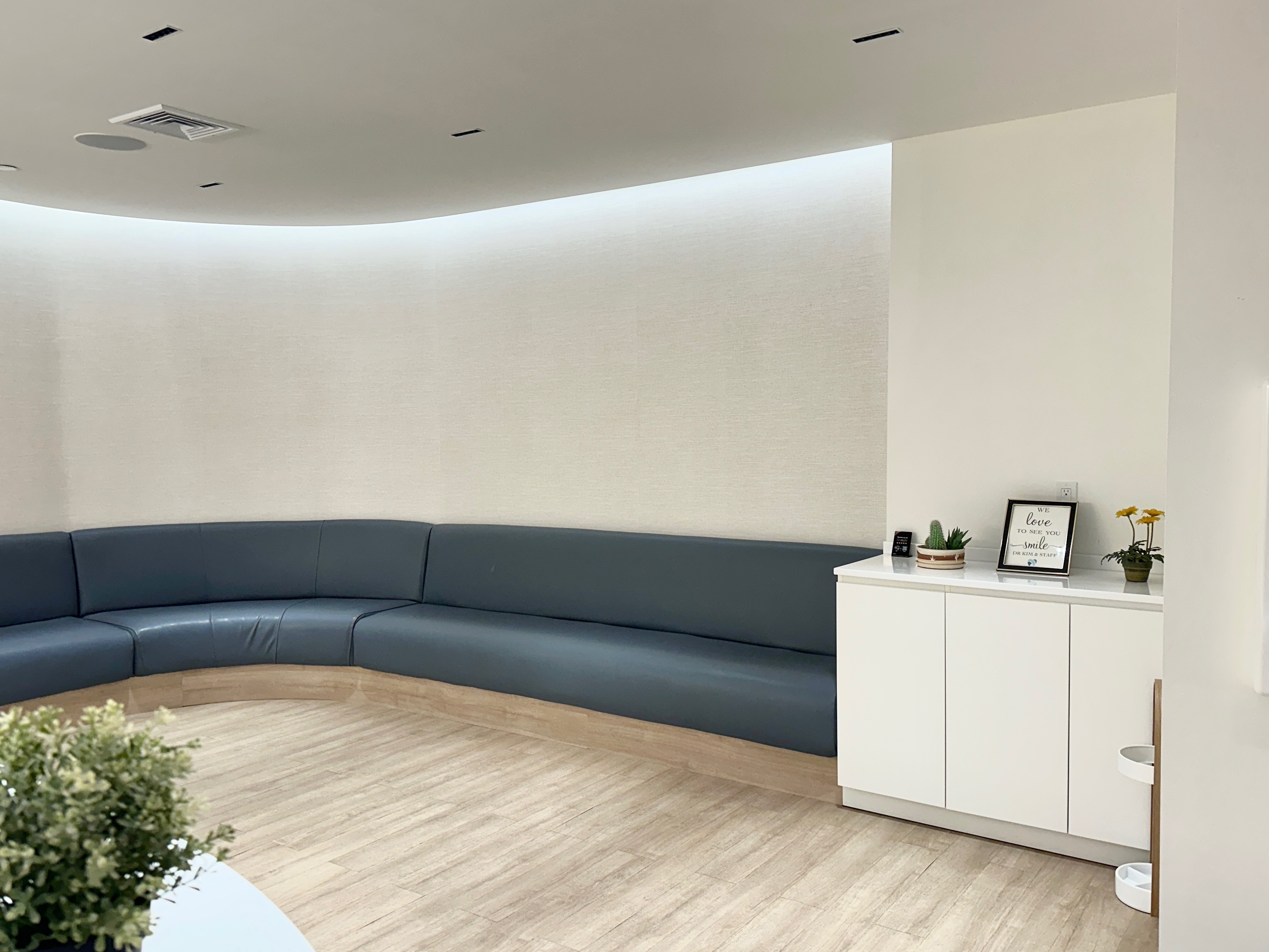 Comfortable curved waiting room with ambient lighting